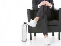 Businessman Sitting Wearing Sneakers